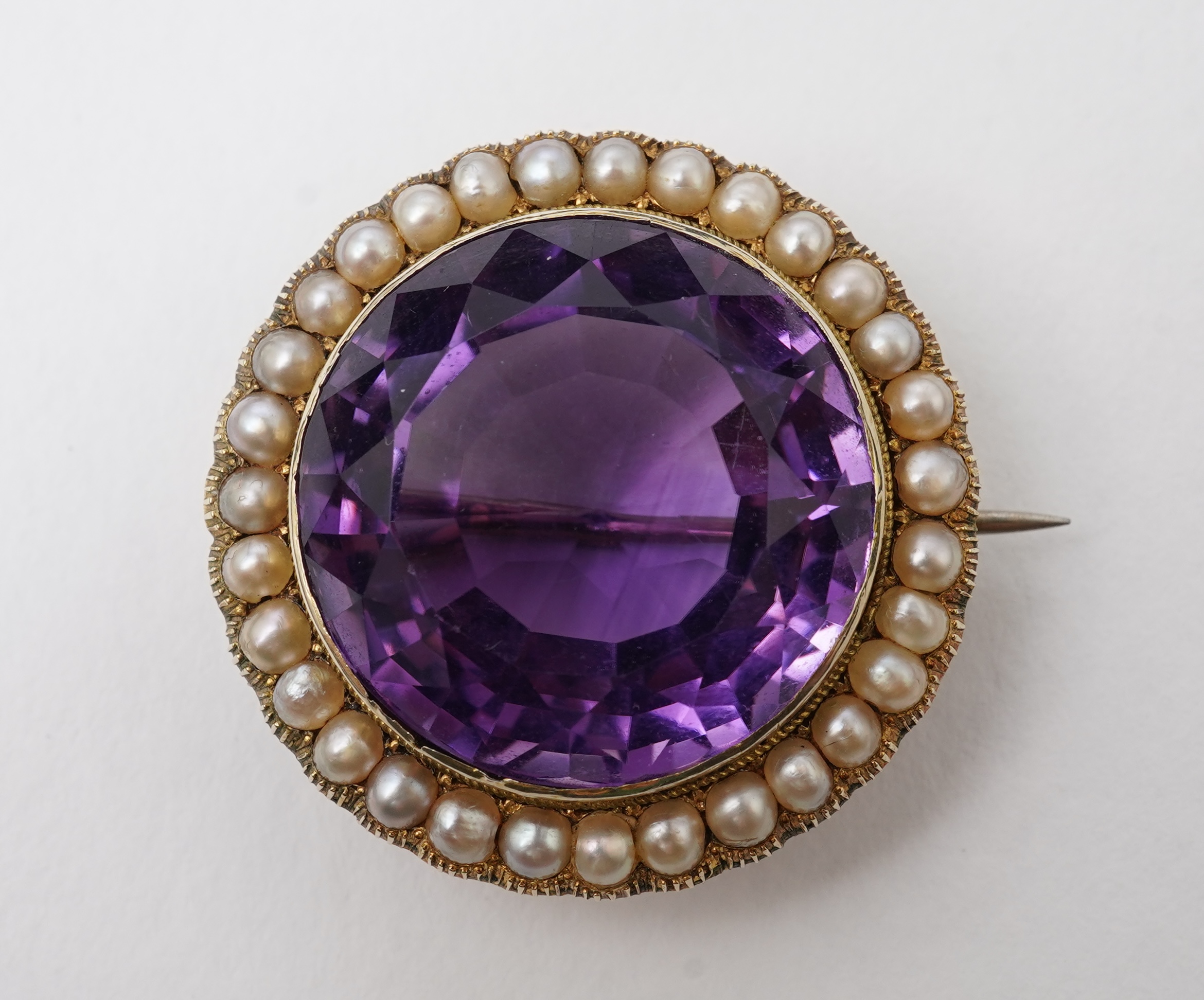 An Edwardian amethyst and seed pearl brooch, early 20th century
